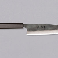 Kokugei Santoku Aogami #1 Kuro-uchi Ebony 165 mm je vsestranski japonski kuhinjski nož, namenjen za pripravo mesa, rib in zelenjave.