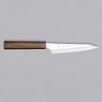 Kurosaki Petty Gekko VG-XEOS Migaki 130 mm_1 Kurosaki petty Gekko je še eno unikatno rezilo nadarjenega kovaškega mojstra Yu Kurosakija. Rezilo je obdelano do videza visokega sijaja, zato so v kovačiji nož poimenovali Gekko, mesečina. Rezilo je izdelano iz jekla VG-XEOS s fino mikrostrukturo in odlično odpornostjo proti obrabi in koroziji.