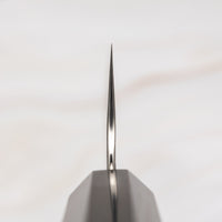 Choil (presek) noža. Nigara Gyuto SG2 Tsuchime Wa 240 mm je večnamenski japonski kuhinjski nož, primeren za pripravo mesa, rib in zelenjave. Jedro iz prašnega jekla SG2 ter hamaguri presek profila zagotavljata dolgotrajno ostrino ter minimalno vzdrževanje. Rezilo ima heksagonalni tsuchime vzorec in japonski ročaj iz redke ebenovine.