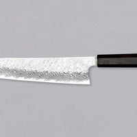 Nigara Gyuto VG-10 Damascus Tsuchime 240 mm je večnamenski japonski kuhinjski nož, primeren za pripravo mesa, rib in zelenjave. Jedro iz nerjavečega VG-10 jekla zagotavlja dolgotrajno ostrino ter minimalno vzdrževanje. Izjemne lastnosti in videz rezila dopolnjuje ročaj japonskega tipa (Wa) iz luksuzne ebenovine.