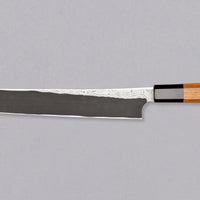 Nigara Kurozome Sakimaru Yanagiba Aogami #2 Damascus 270 mm je tradicionalni japonski nož, ki se uporablja za pripravo rib. Ime sakimaru se nanaša na tanto konico, ki je poklon katani. Dolgo rezilo omogoča lepe in dolge gibe, prirezana konica pa natančen zaključek reza.